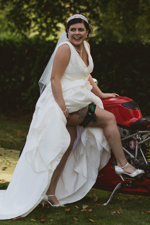 Emma, showing off her custom made Rifles Regiment wedding garter